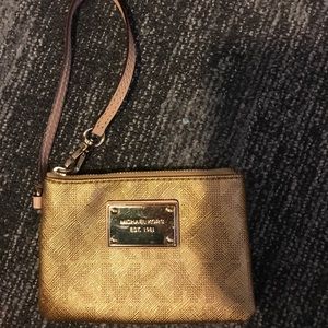 Classy gold Michael Kors wristlet!!